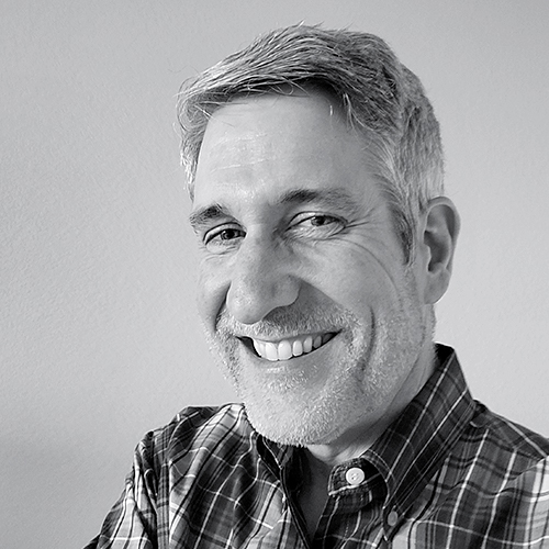 Mike Perkins, CEO of Vergence, black and white headshot